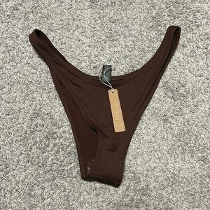 NWT skims cheeky tanga bottoms